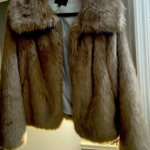 Slightly used faux fur jacket